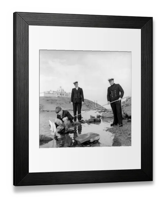Framed Print : The lighthouse keepers and their families go about their daily duties around The Strathy Framed Print : The lighthouse keepers and their families go about their daily duties around The Strathy