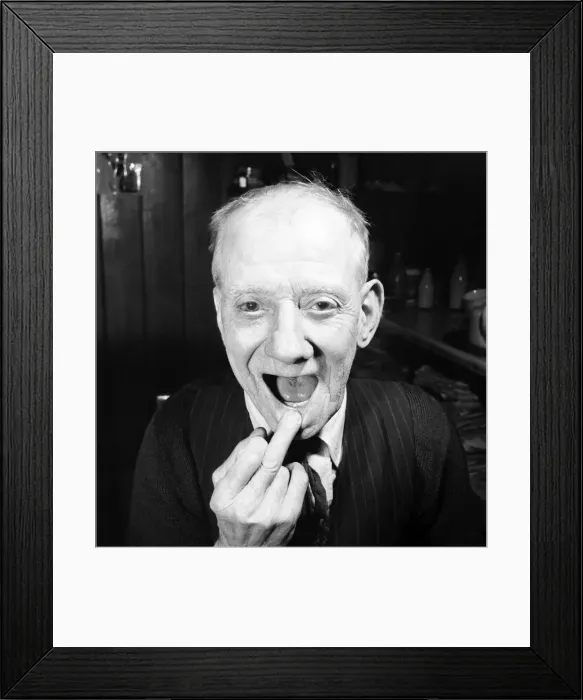 Framed Print : Pensioner with a new tooth. 77 year old man (George Berry) shows off his new tooth Framed Print : Pensioner with a new tooth. 77 year old man (George Berry) shows off his new tooth