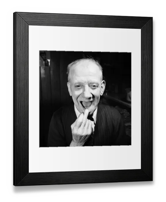 Framed Print : Pensioner with a new tooth. 77 year old man (George Berry) shows off his new tooth