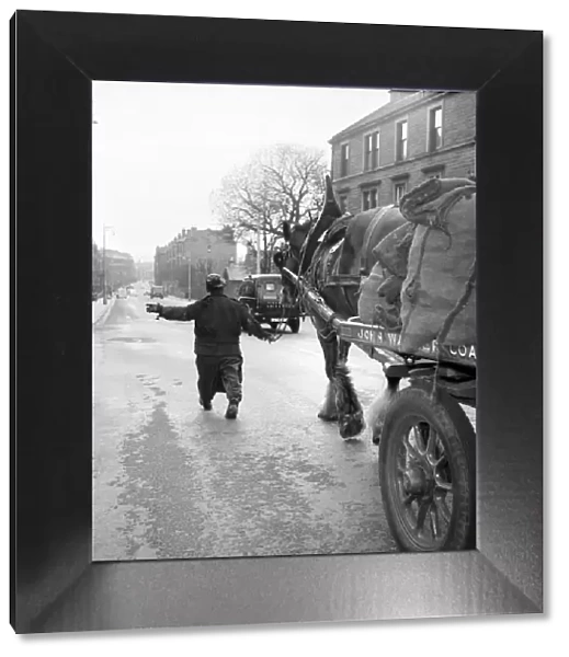 Coalman delivering coal. May 1958 A687-001