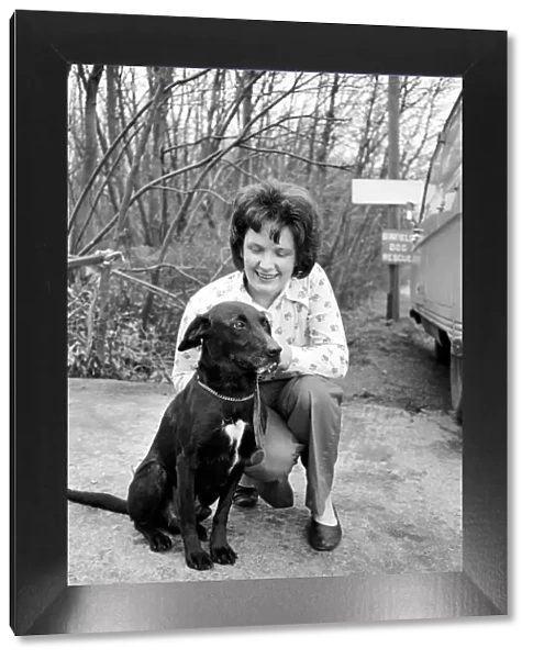 Christine Smith with dog. March 1975 75-01222