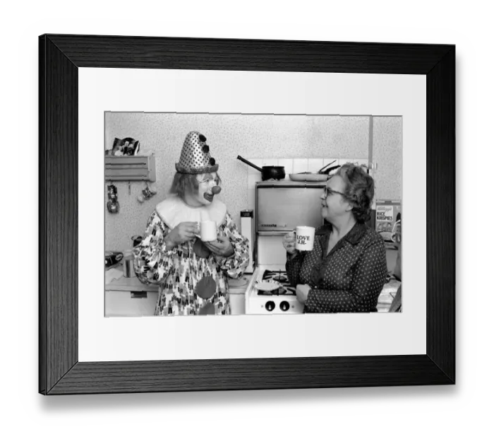 Framed Print : Child Entertainer: Mr. Blower the clown seen here at a ChildrenIs birthday party