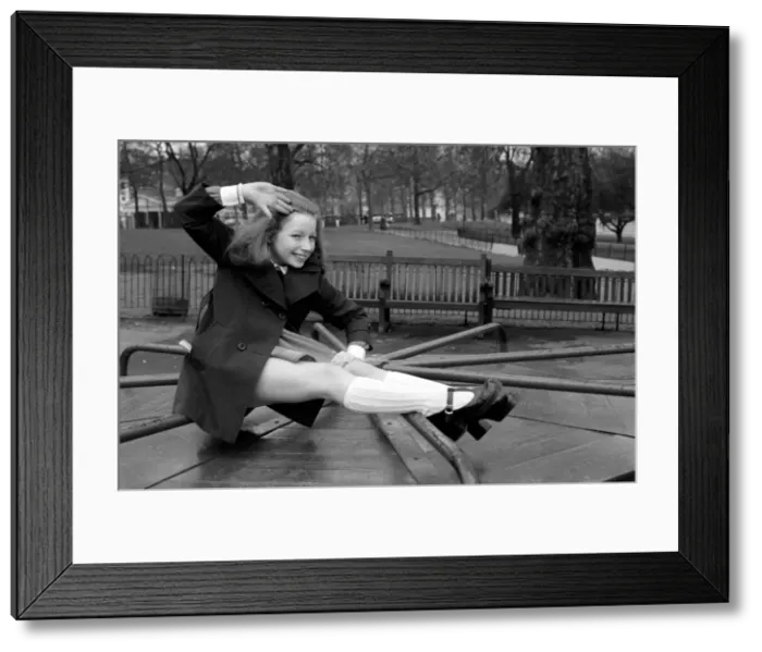 Framed Print : Child: Singer: Lena Zavaroni enjoying herself in Green Park, London Framed Print : Child: Singer: Lena Zavaroni enjoying herself in Green Park, London