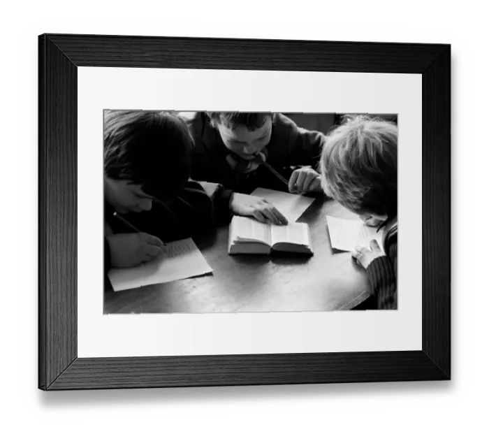 Framed Print : Education: Lack of text books in the early 1980s led to school children having to