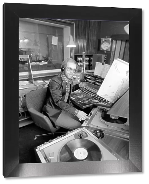 Pop Star: Elton John. Elton John records his first programme as a disk jockey at the BBC