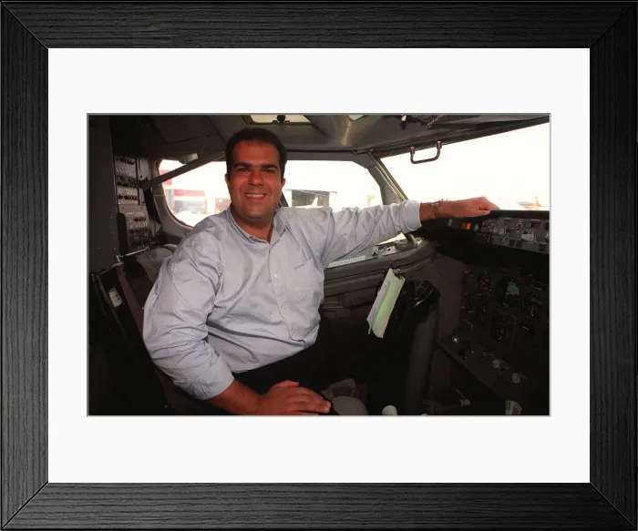 Framed Print : Easyjet owner Stelios Haji-Loannou sitting at aeroplane controls October 1997