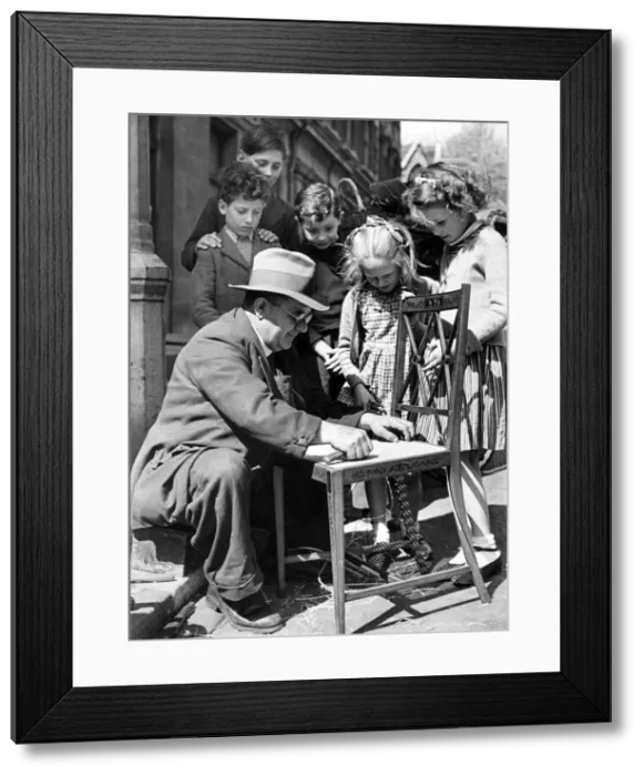 Framed Print : Some of the children watching are evacuees from Gibraltar. April 1943 P004942 Framed Print : Some of the children watching are evacuees from Gibraltar. April 1943 P004942