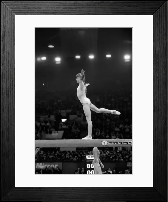 Framed Print : Nadia Comaneci competiting in Champions All'Gymnastics Competition
