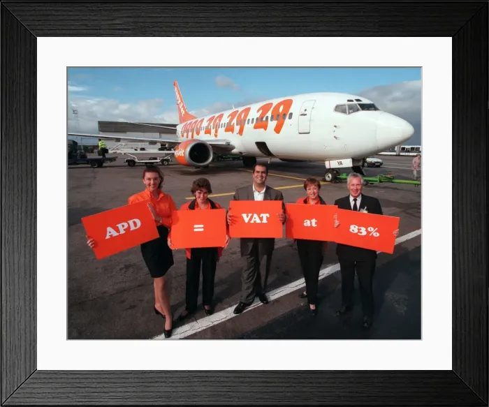 Framed Print : Stelios Haji-loannou of easyJet October 1997 With staff beside aircraft Holding orange Framed Print : Stelios Haji-loannou of easyJet October 1997 With staff beside aircraft Holding orange