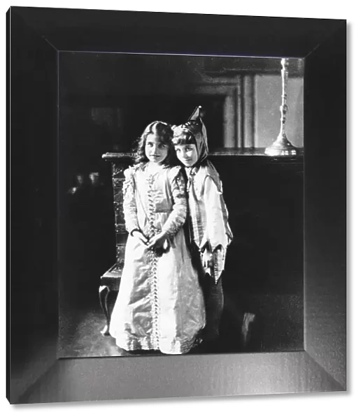 The young Lady Elizabeth Bowes-Lyon, aged 9, with brother David at Glamis Castle