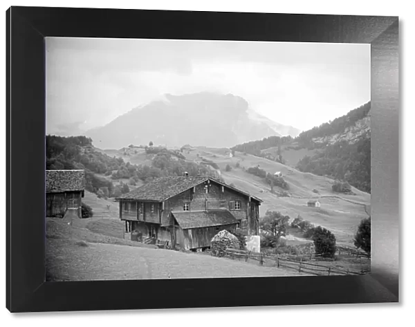 Farmhgouse high up in the Alps above the town of Seelisburg in Switzerland. August 1936
