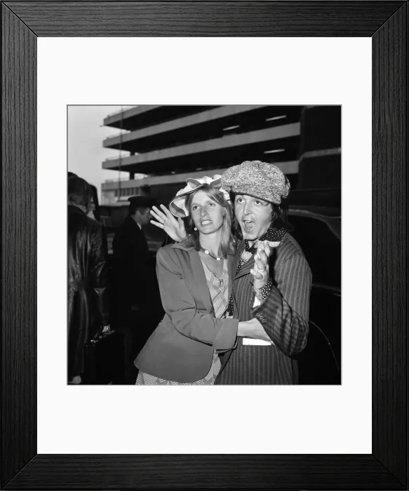 Framed Print : Paul McCartney seen here with his wife Linda at Heathrow Airport. April 1975 75-1772-003 Framed Print : Paul McCartney seen here with his wife Linda at Heathrow Airport. April 1975 75-1772-003
