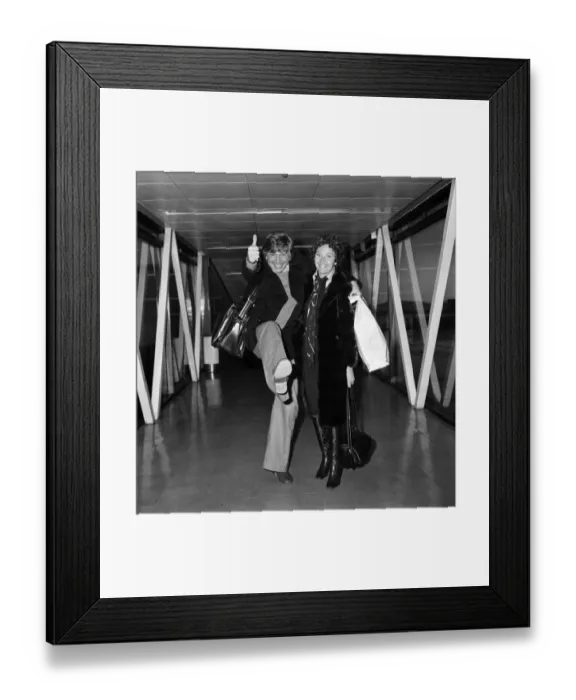 Framed Print : Tommy Steele and his wife, Anne, at Heathrow Airport after arriving from the south of Framed Print : Tommy Steele and his wife, Anne, at Heathrow Airport after arriving from the south of
