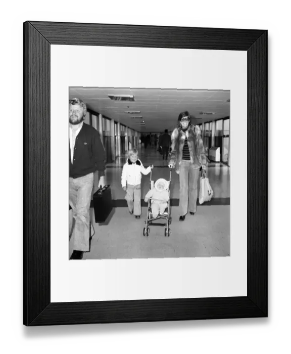 Framed Print : Entertainer Cilla Black seen here at Heathrow Airport with her husband and children Framed Print : Entertainer Cilla Black seen here at Heathrow Airport with her husband and children