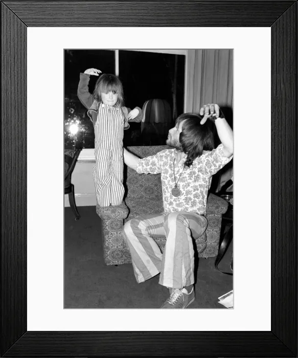 Framed Print : Bill Oddie seen here at home with his daughters. Oddie is a member of the Goodies Framed Print : Bill Oddie seen here at home with his daughters. Oddie is a member of the Goodies