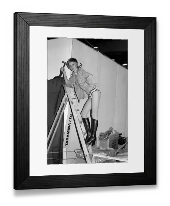 Framed Print : London Fashion Fair International: Model Laura Venner, 22 helping to fix up the stand for Framed Print : London Fashion Fair International: Model Laura Venner, 22 helping to fix up the stand for