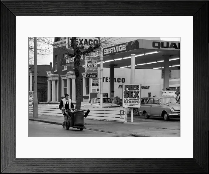 Framed Print : Sex'Garage Sign. In a bid to get business in the Easter Petrol War Framed Print : Sex'Garage Sign. In a bid to get business in the Easter Petrol War