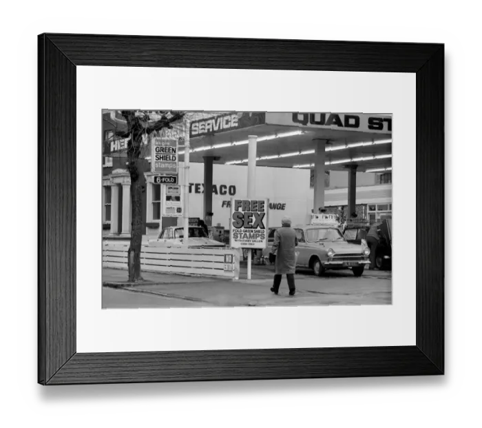 Framed Print : Sex'Garage Sign. In a bid to get business in the Easter Petrol War