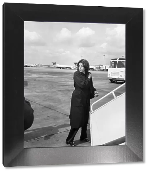 Christine Onassis flew into Heathrow Airport today - first class