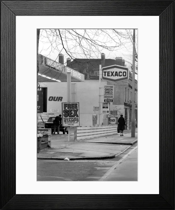 Framed Print : Sex'Garage Sign. In a bid to get business in the Easter Petrol War Framed Print : Sex'Garage Sign. In a bid to get business in the Easter Petrol War