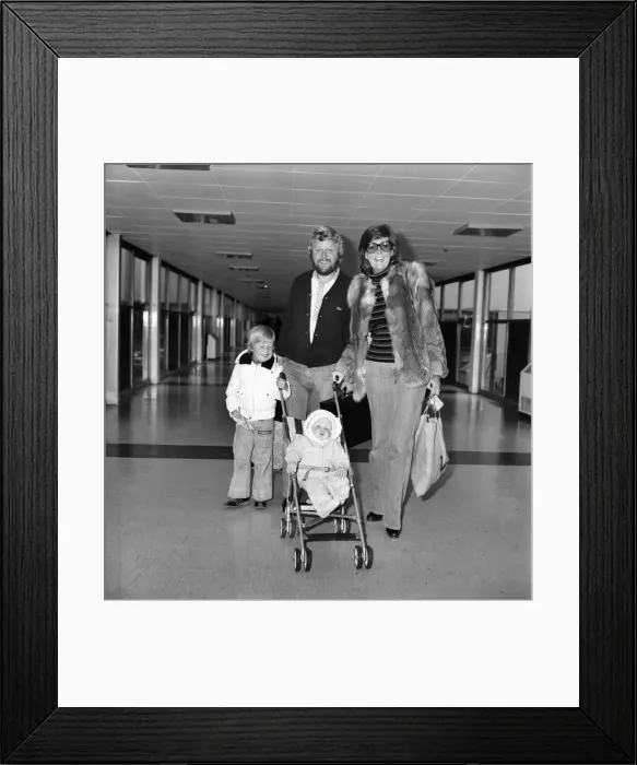 Framed Print : Entertainer Cilla Black seen here at Heathrow Airport with her husband and children Framed Print : Entertainer Cilla Black seen here at Heathrow Airport with her husband and children