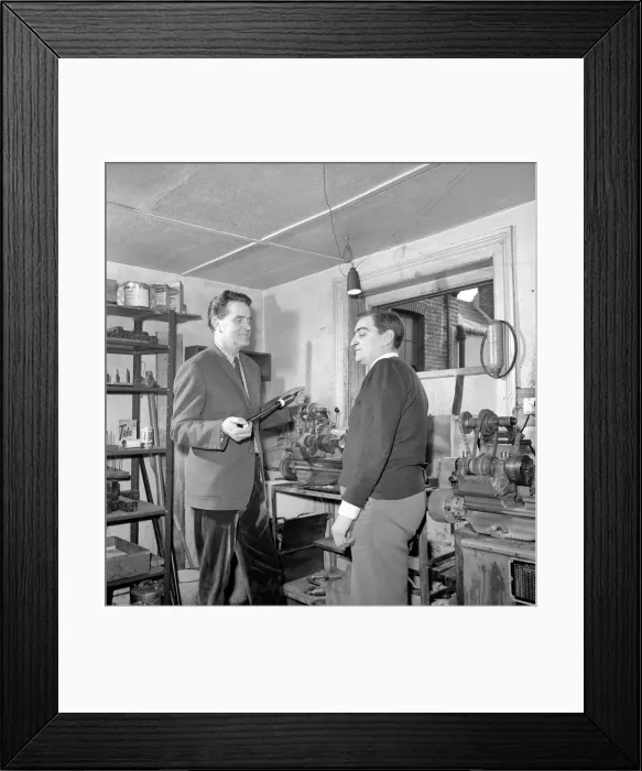 Framed Print : Bagpipe maker Mr. George Alexander seen here in his workshop. Circa 1960