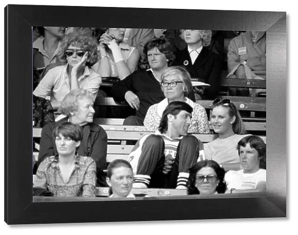 Wimbledon 80, 3rd Day. Ilie Nastase pictured with Miss U. K. Caroline Seeward