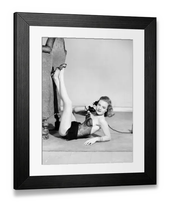 Framed Print : Model wearing underwear on telephone. July 1956 E227-003 Framed Print : Model wearing underwear on telephone. July 1956 E227-003