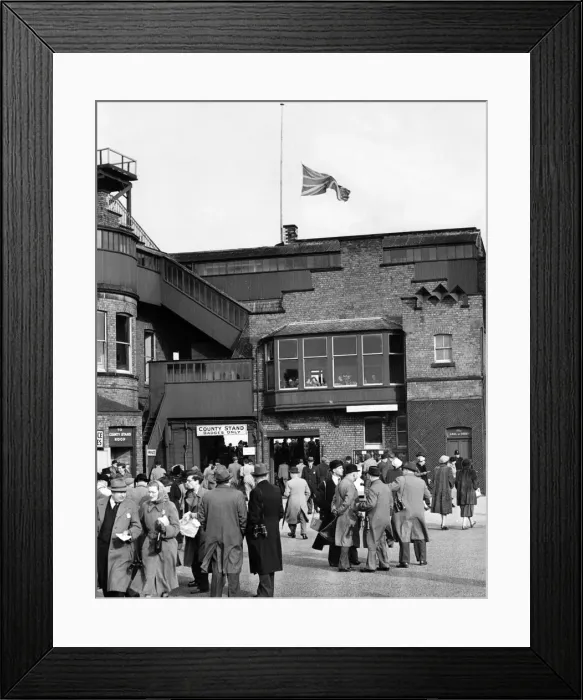 Framed Print : As racegoers crowded the paddock, the Union Jack flew at half-mast over the grandstand as Framed Print : As racegoers crowded the paddock, the Union Jack flew at half-mast over the grandstand as