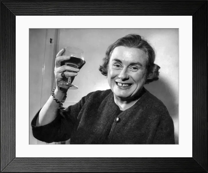 Framed Print : Miss. Gwen Robyns raises a glass of wine. December 1960 Framed Print : Miss. Gwen Robyns raises a glass of wine. December 1960