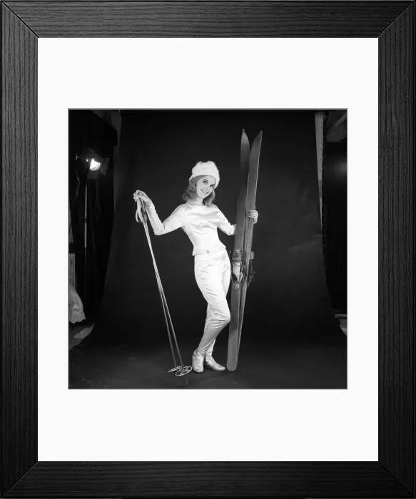 Framed Print : Clothing: Fashion: Woman wearing skiing outfit converted from wedding dress Framed Print : Clothing: Fashion: Woman wearing skiing outfit converted from wedding dress