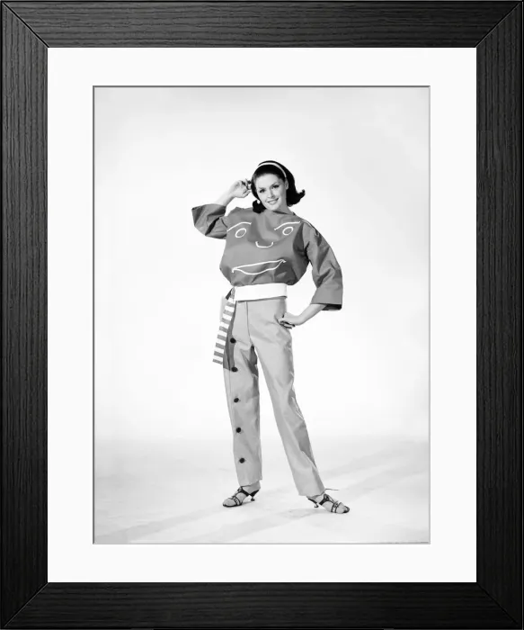 Framed Print : Clothing: Fashion: Woman wearing funny face trouser suit. 1964 B1723a-001 Framed Print : Clothing: Fashion: Woman wearing funny face trouser suit. 1964 B1723a-001