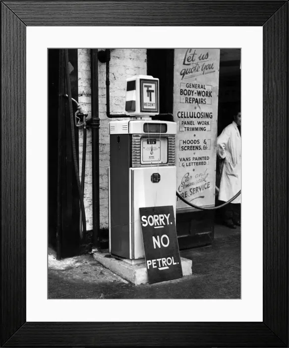 Framed Print : A signing on a petrol pump informing customers of the lack of petrol during the fuel Framed Print : A signing on a petrol pump informing customers of the lack of petrol during the fuel