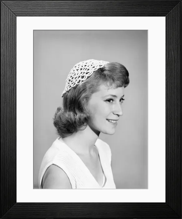 Framed Print : Woman wearing pipe clearner hat. July 1956