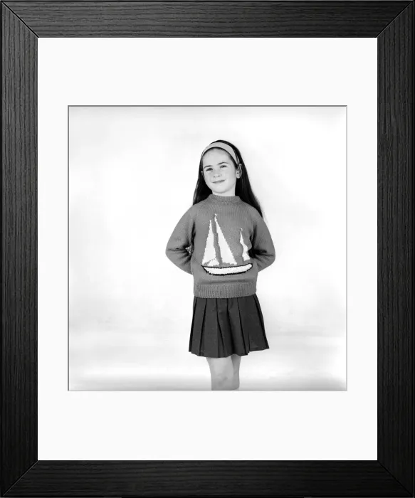 Framed Print : Small girl wearing Chichester sweaters in celebration of Sir Francis Chichester round Framed Print : Small girl wearing Chichester sweaters in celebration of Sir Francis Chichester round