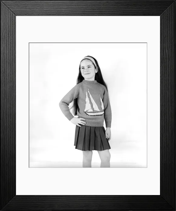 Framed Print : Young girl wearing Chichester sweaters in celebration of Sir Francis Chichester round