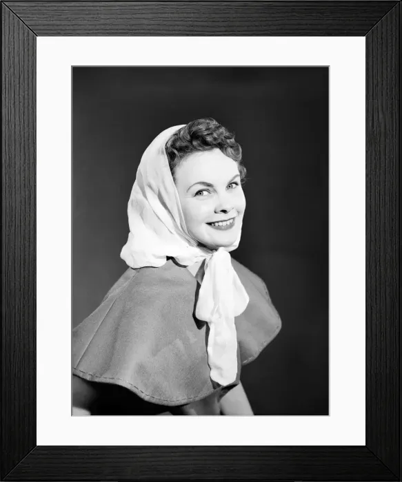 Framed Print : Model Maureen Denham putting on head scarf. July 1956 Framed Print : Model Maureen Denham putting on head scarf. July 1956