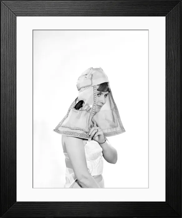 Framed Print : Woman wearing utility hat. Circa 1960 Framed Print : Woman wearing utility hat. Circa 1960