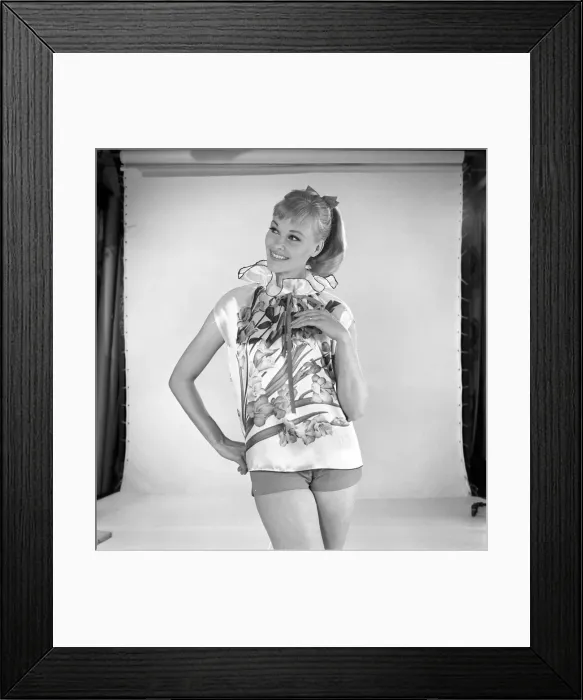 Framed Print : Woman modelling floral blouse. Circa 1960 Framed Print : Woman modelling floral blouse. Circa 1960