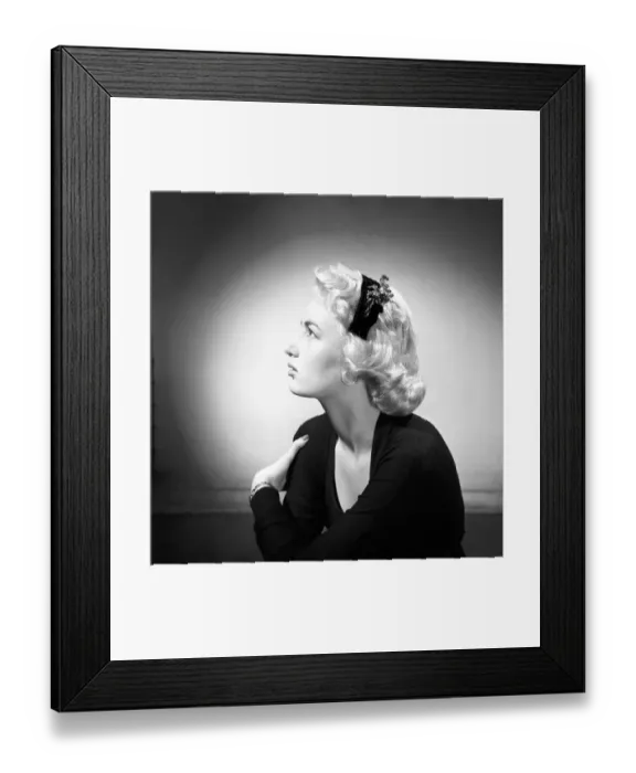 Framed Print : Woman modelling the latest 1956 hat fashions in the Reveille studios. June 1956