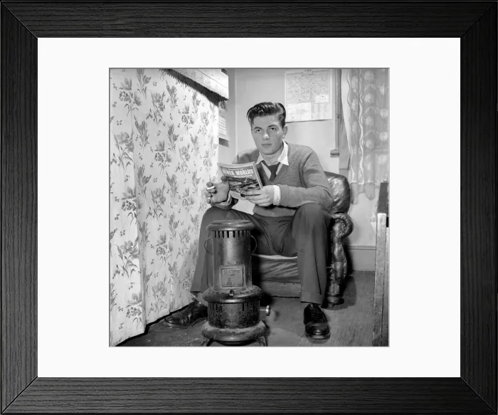 Framed Print : Teenage author Thomas Folks seen here reading science fiction stories in his bedroom Framed Print : Teenage author Thomas Folks seen here reading science fiction stories in his bedroom