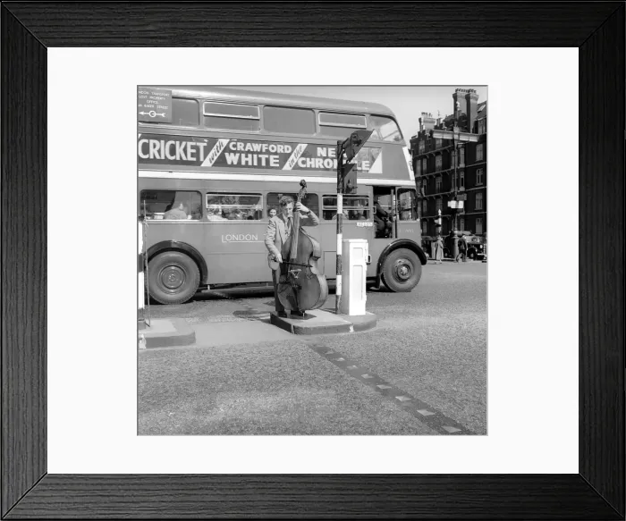 Framed Print : Occupation: Busker: Johnny Hawksworth seen here busking with his Double Bass in Central