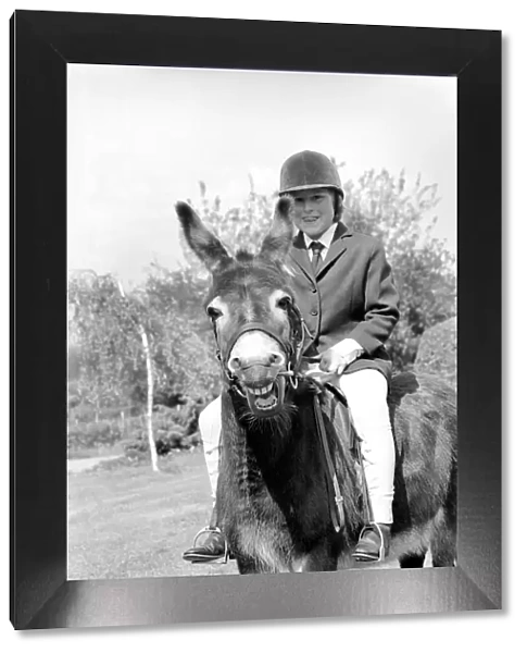 Nine year old girl on her donkey at the Donkey racing championships May 1975