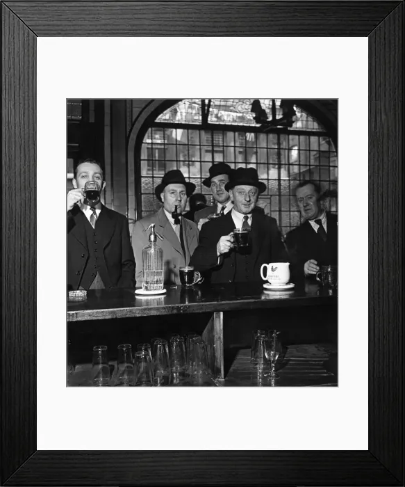 Framed Print : Barristers, clerks and newsmen from a neighbouring office gather together at the Feathers Framed Print : Barristers, clerks and newsmen from a neighbouring office gather together at the Feathers