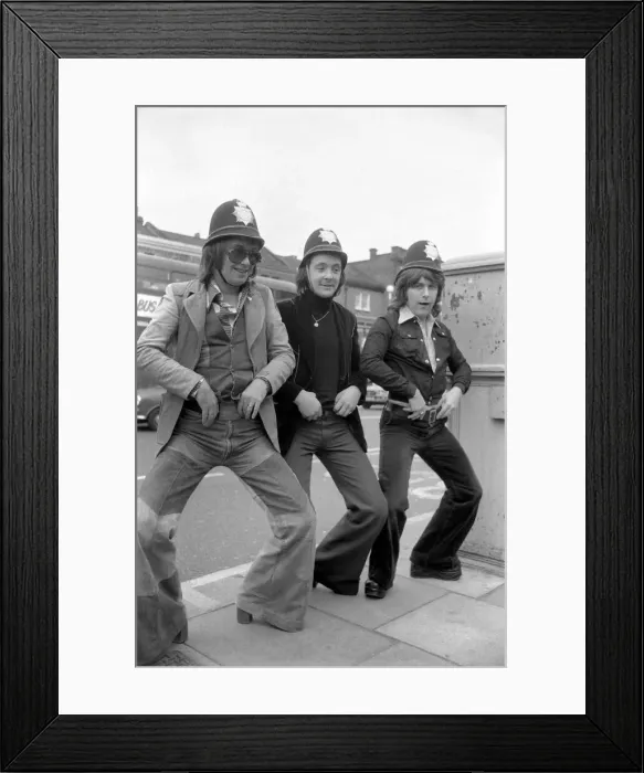 Framed Print : Pop Group Mud'dressed in police helmets May 1975 Framed Print : Pop Group Mud'dressed in police helmets May 1975
