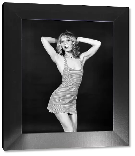 Glamour model Elena wearing a mini dress. April 1975