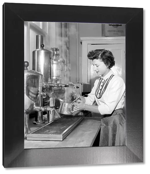 Waitress  /  woman seen here preparing pots of tea in a cafe. 1957 A17b-002