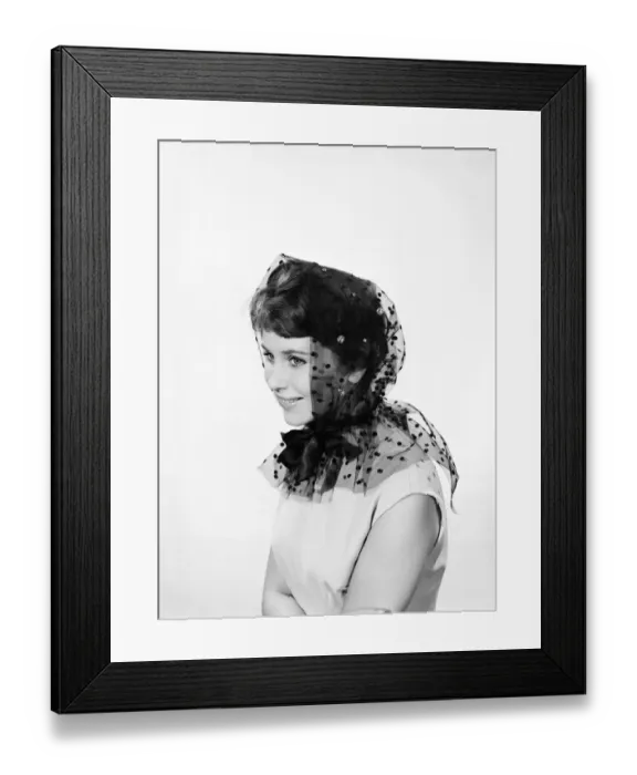 Framed Print : Model Ann Cave wearing a collection of spring and summer hats. Circa 1962 Framed Print : Model Ann Cave wearing a collection of spring and summer hats. Circa 1962