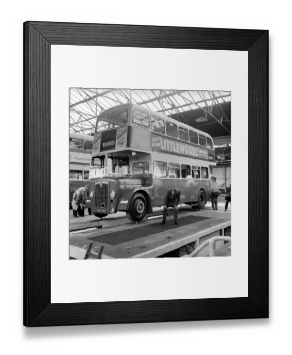 Framed Print : Bus balanced on Cups from the Josiah Wedgewood and Son fine China company to demonstrate