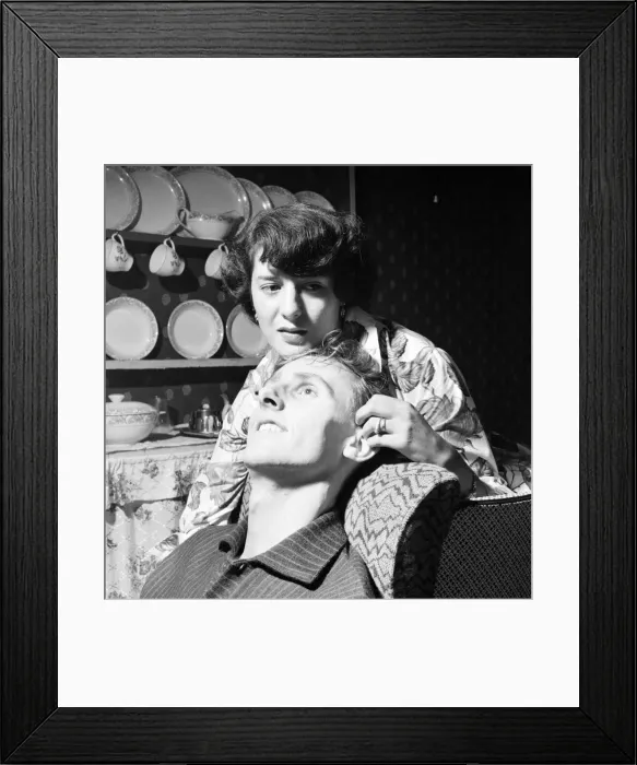 Framed Print : Mr. and Mrs. Health seen here at home discussing how he proposed marriage to her Framed Print : Mr. and Mrs. Health seen here at home discussing how he proposed marriage to her